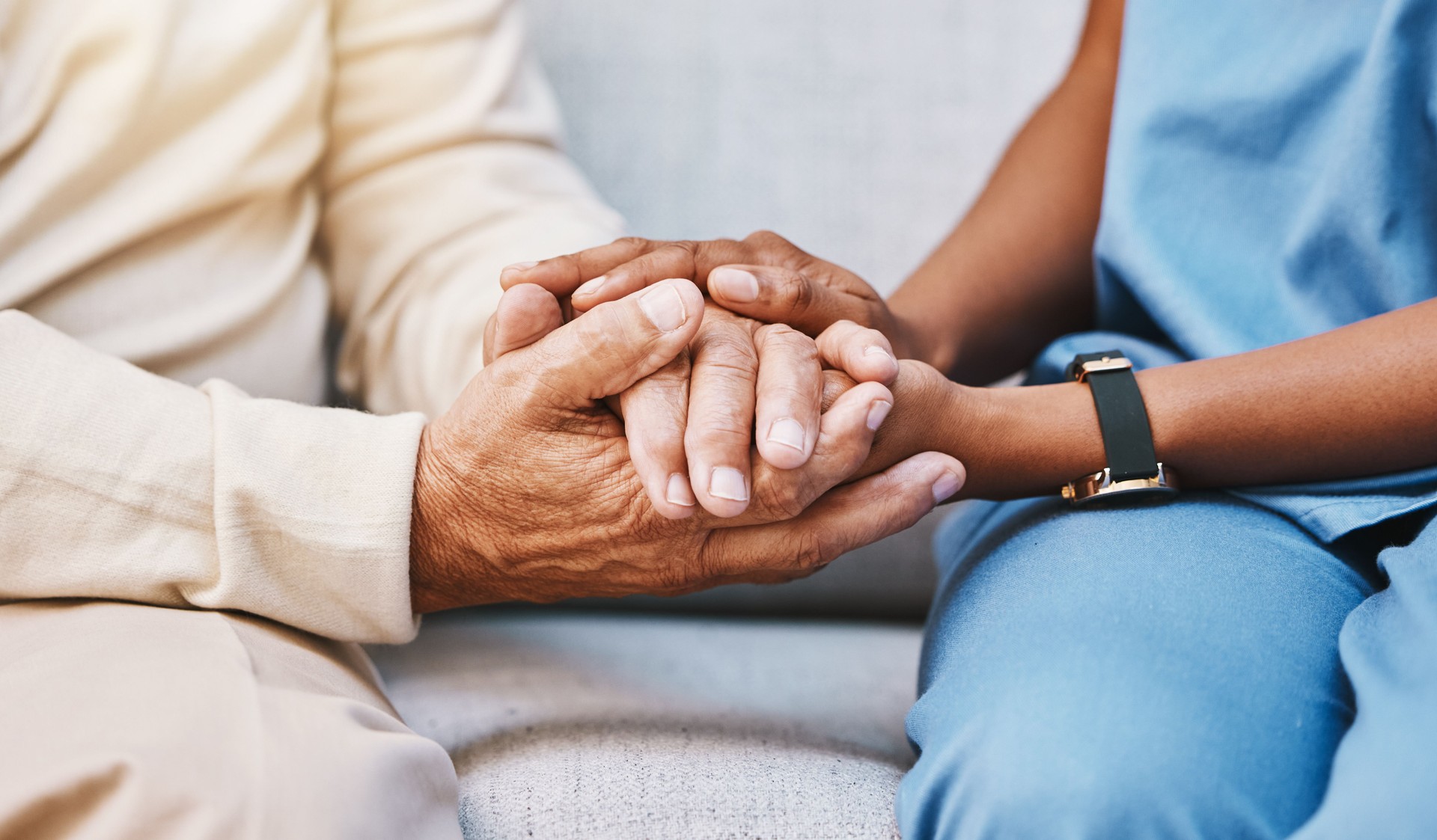 Nurse, hands and senior patient in empathy, safety and support of help, trust and healthcare consulting. Nursing home, counseling and gratitude for medical caregiver, client and hope in consultation